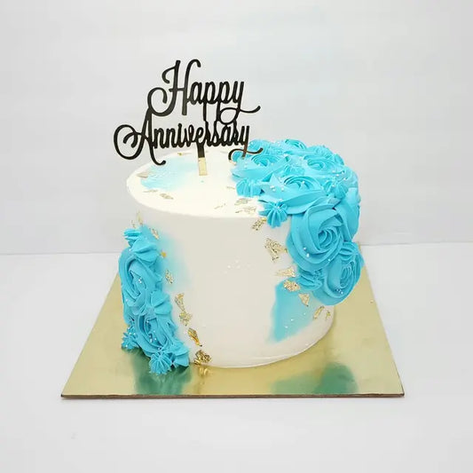 Vibrant blue rose Anniversary cake