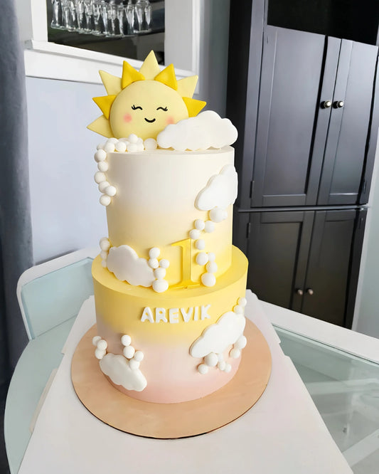 Sun baby shower cake