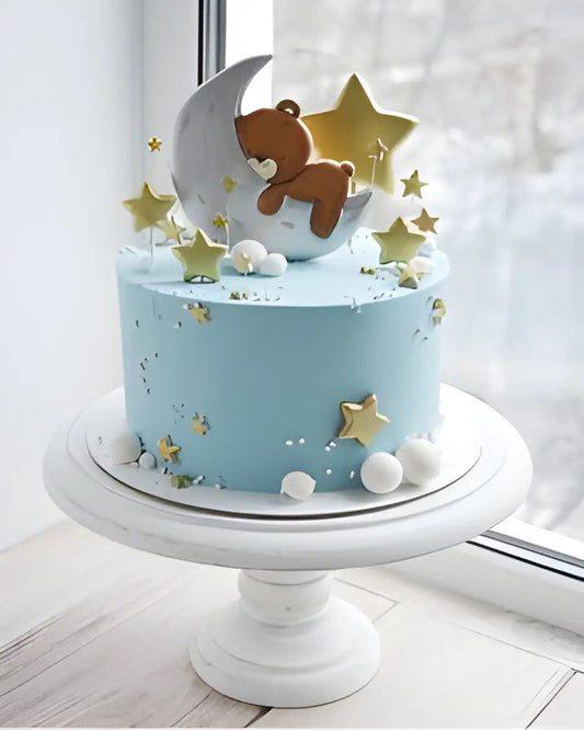 Baby shower moon star cake