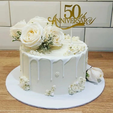 White flora anniversary cake