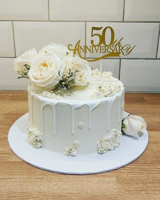 White flora anniversary cake
