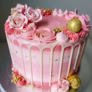 Pink drippy designer cake