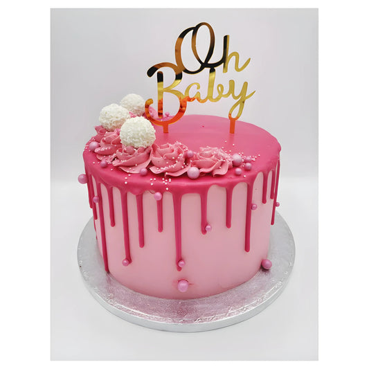 Pink baby shower drippy cake